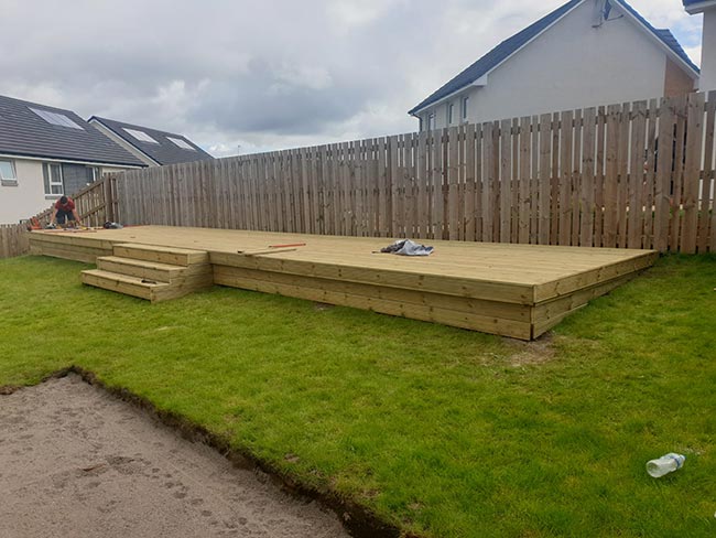 After photo once the large timber garden decking