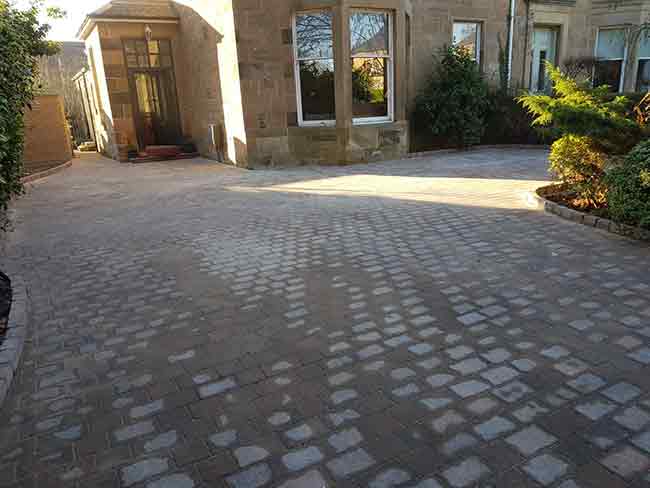 After photo of the driveway in Glasgow with their new Momoblock Driveway with edges and drainage stank. Newlands Road