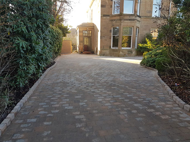 After photo of the driveway in Glasgow with their new Momoblock Driveway with edges and drainage stank