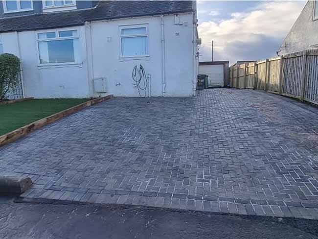 After photos of the slate monoblock paving with a charcoal border
