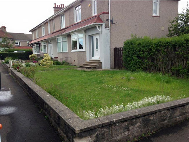 Before photo of the front garden with grass and hedge in Glasgow