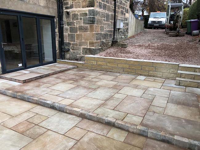 Autumn harvest multi Indian sandstone, with tobermore edging kerb to build steps.